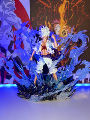 Action figure Monkey D. Luffy Gear 5 One Piece con effetto energia blu, dettagli animati.