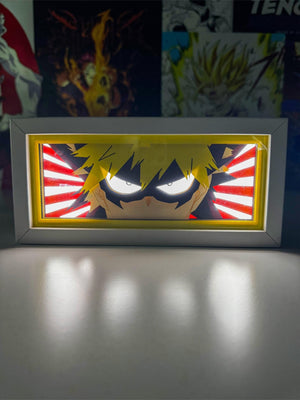 Light box LED con illustrazione Bakugo di My Hero Academia, sfondo rosso a raggi.
