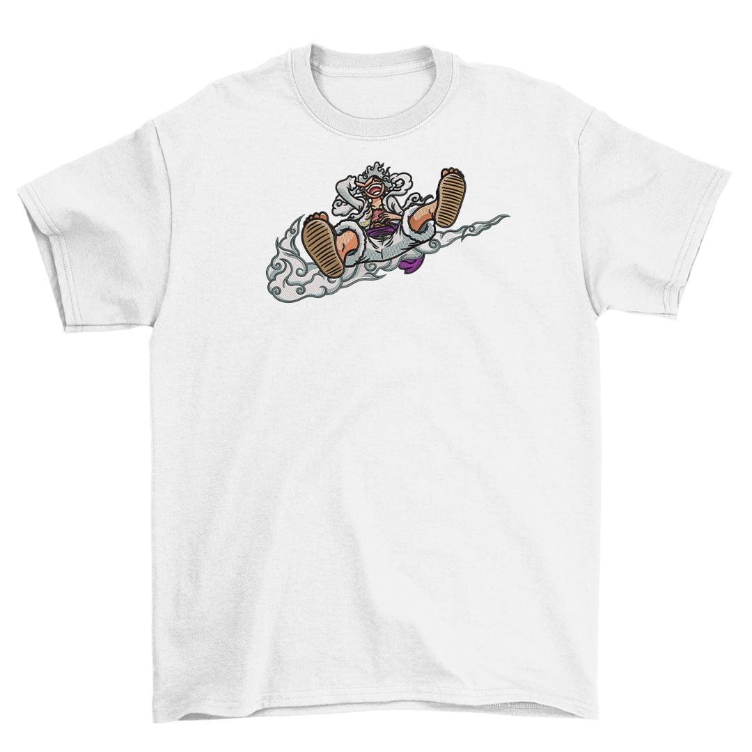 T-shirt bianca con ricamo di personaggio anime seduto su nuvola, stile streetwear.