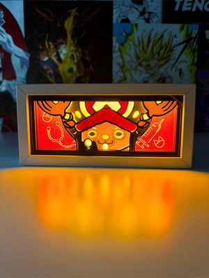 Lampada light box decorativa con Chopper di One Piece, illuminata, stile anime, su sfondo colorato.