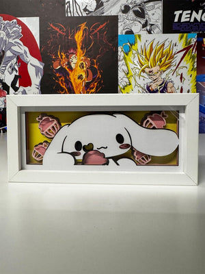 Light box con personaggio kawaii bianco e dolci rosa, sfondo poster anime