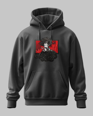 Felpa nera con cappuccio, stampa ricamata Goku bambino su sfondo rosso in stile anime.