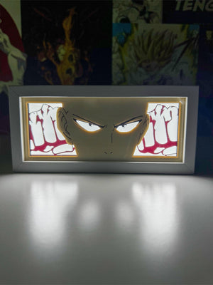 Lampada LED decorativa con Saitama di One Punch Man in stile anime, illuminata su sfondo scuro
