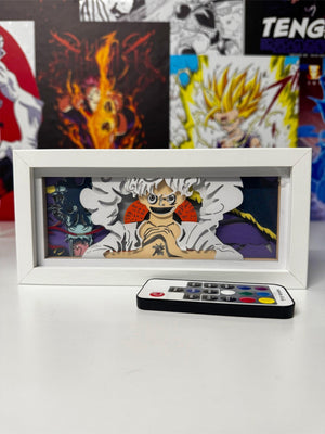 Lampada light box Luffy Gear 5 One Piece con cornice bianca e telecomando, poster anime sullo sfondo