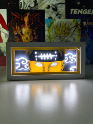 Light box anime con volto di Pain illuminato, occhi Rinnegan e nuvole Akatsuki, decorazione