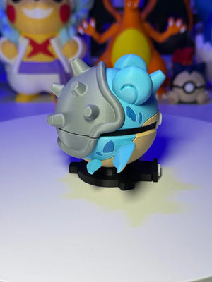 Figura Lapras Pokéball 3D con base magnetica, sfondo personaggi anime, luce blu.